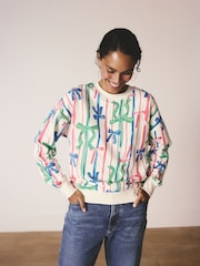 Pink/Blue Seasonal Bows All Over Print Graphic Longsleeve Crewneck Sweatshirt - Image 1 of 8