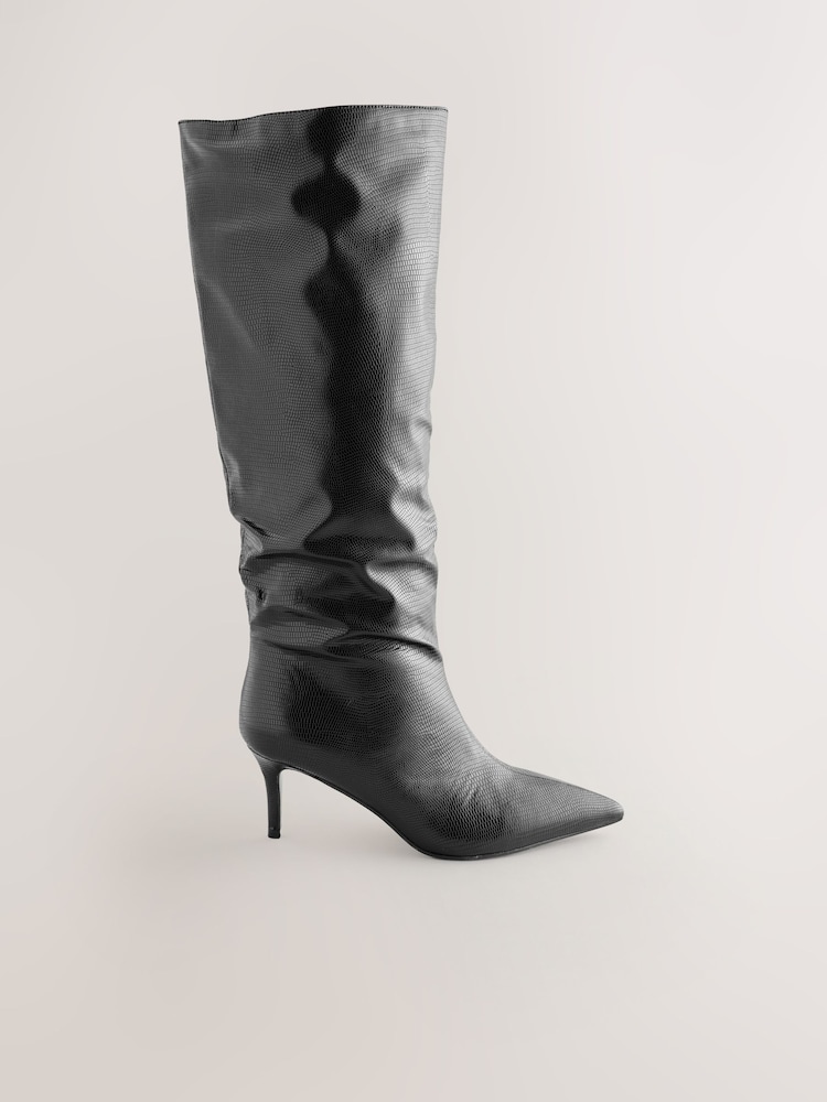 Black Forever Comfort® Point Toe Heel Slouch Knee High Boots - Image 1 of 12