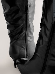 Black Forever Comfort® Point Toe Heel Slouch Knee High Boots - Image 11 of 12
