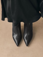 Black Forever Comfort® Point Toe Heel Slouch Knee High Boots - Image 2 of 12