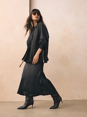 Black Forever Comfort® Point Toe Heel Slouch Knee High Boots - Image 6 of 12