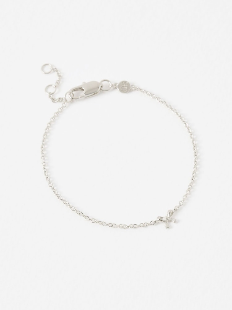 Oliver Bonas Silver Tone Paloma Sterling Mini Bow Bracelet - Image 1 of 3