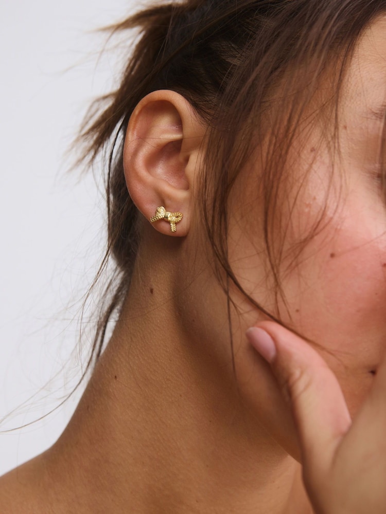 Oliver Bonas Gold Tone Bria Rope Texture Bow Stud Earrings - Image 5 of 5 Oliver Bonas Gold Tone Bria Rope Texture Bow Stud Earrings - Image 5 of 5