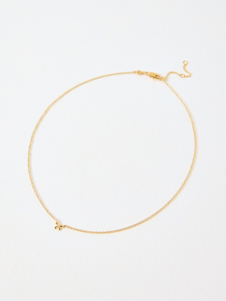 Oliver Bonas Gold Tone Paloma Mini Bow Necklace - Image 1 of 4