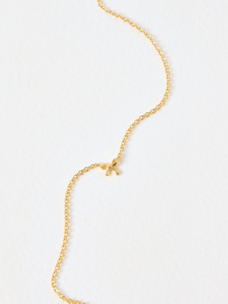 Oliver Bonas Gold Tone Paloma Mini Bow Necklace - Image 2 of 4