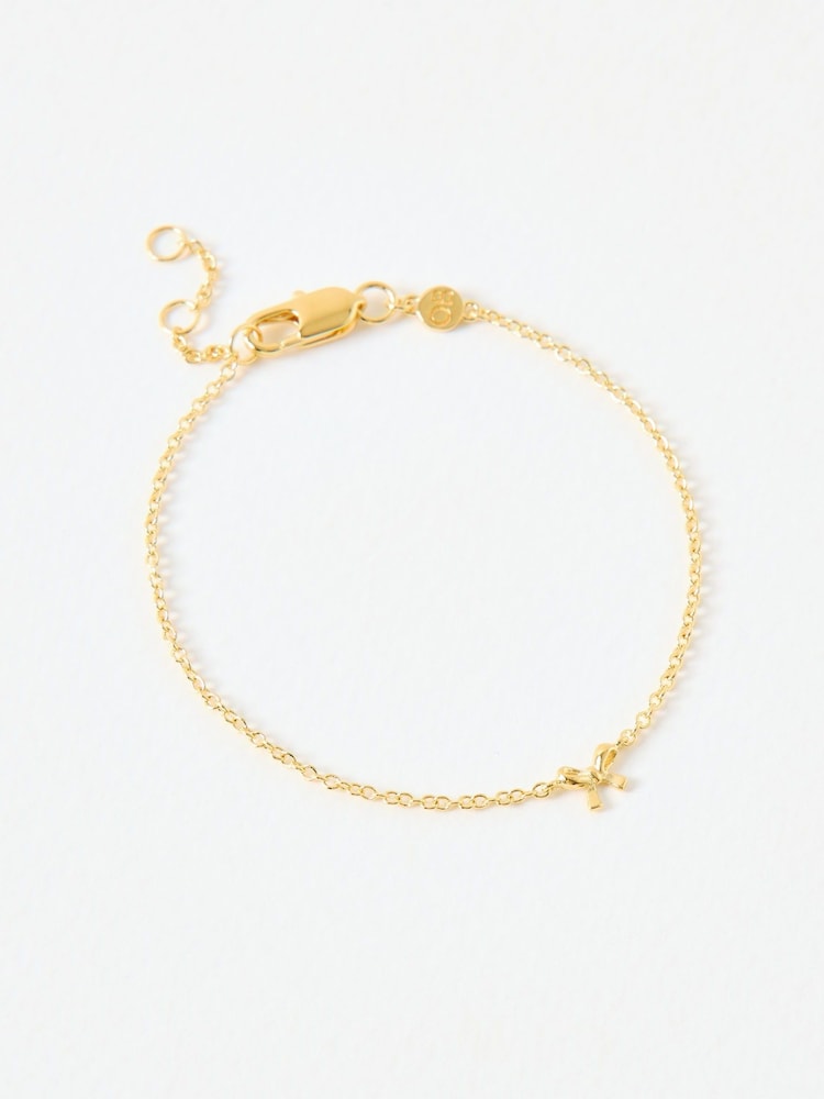 Oliver Bonas Gold Tone Paloma Mini Bow Bracelet - Image 1 of 3