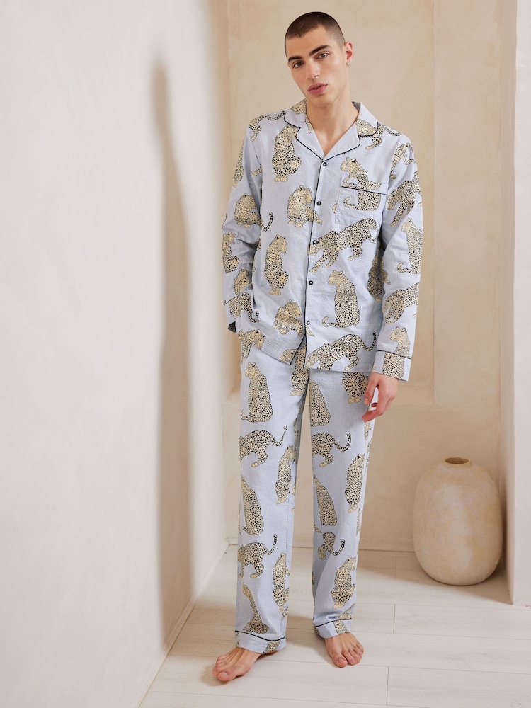 Chelsea Peers Blue Trouser Pyjamas Seersucker Cotton Leopard Stripe Print Long Pyjamas Set - Image 1 of 5 Chelsea Peers Blue Trouser Pyjamas Seersucker Cotton Leopard Stripe Print Long Pyjamas Set - Image 1 of 5
