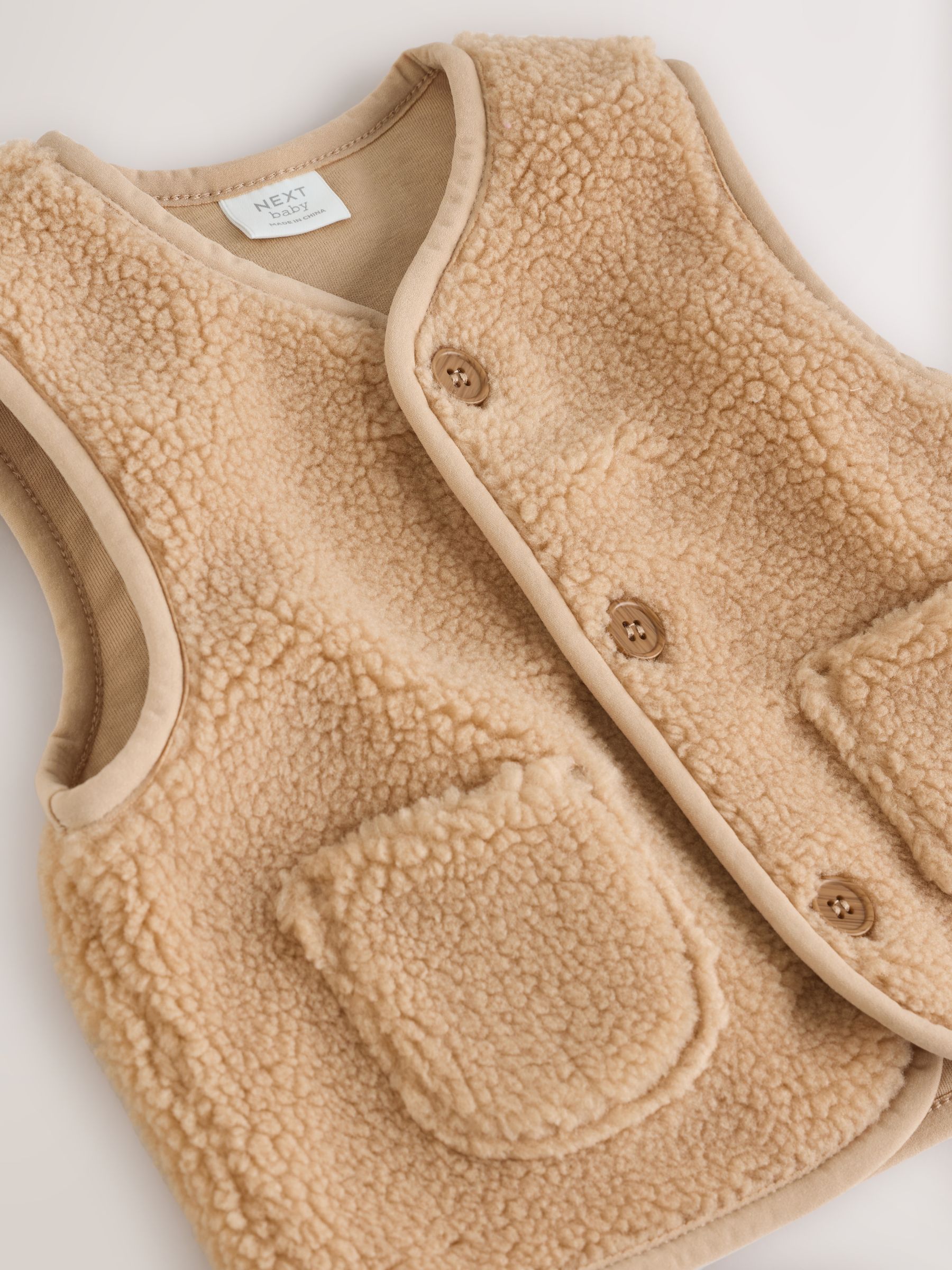 Buy Toffee Brown Borg Baby Gilet from Next USA