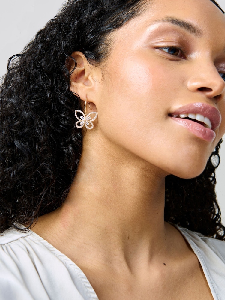 Aela Gold Tone Sparkling Butterfly Fishhook Earrings - Image 1 of 3