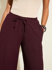 Friends Like These Burgundy Red Crinkle Jersey Wide Leg Trousers - Image 2 of 4