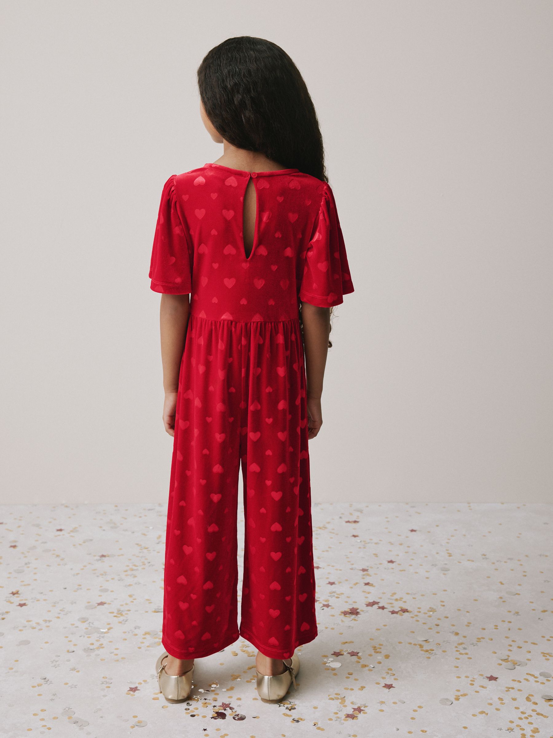 Buy Red Heart Embossed Velour Jumpsuit (3-16yrs) from Next Romania