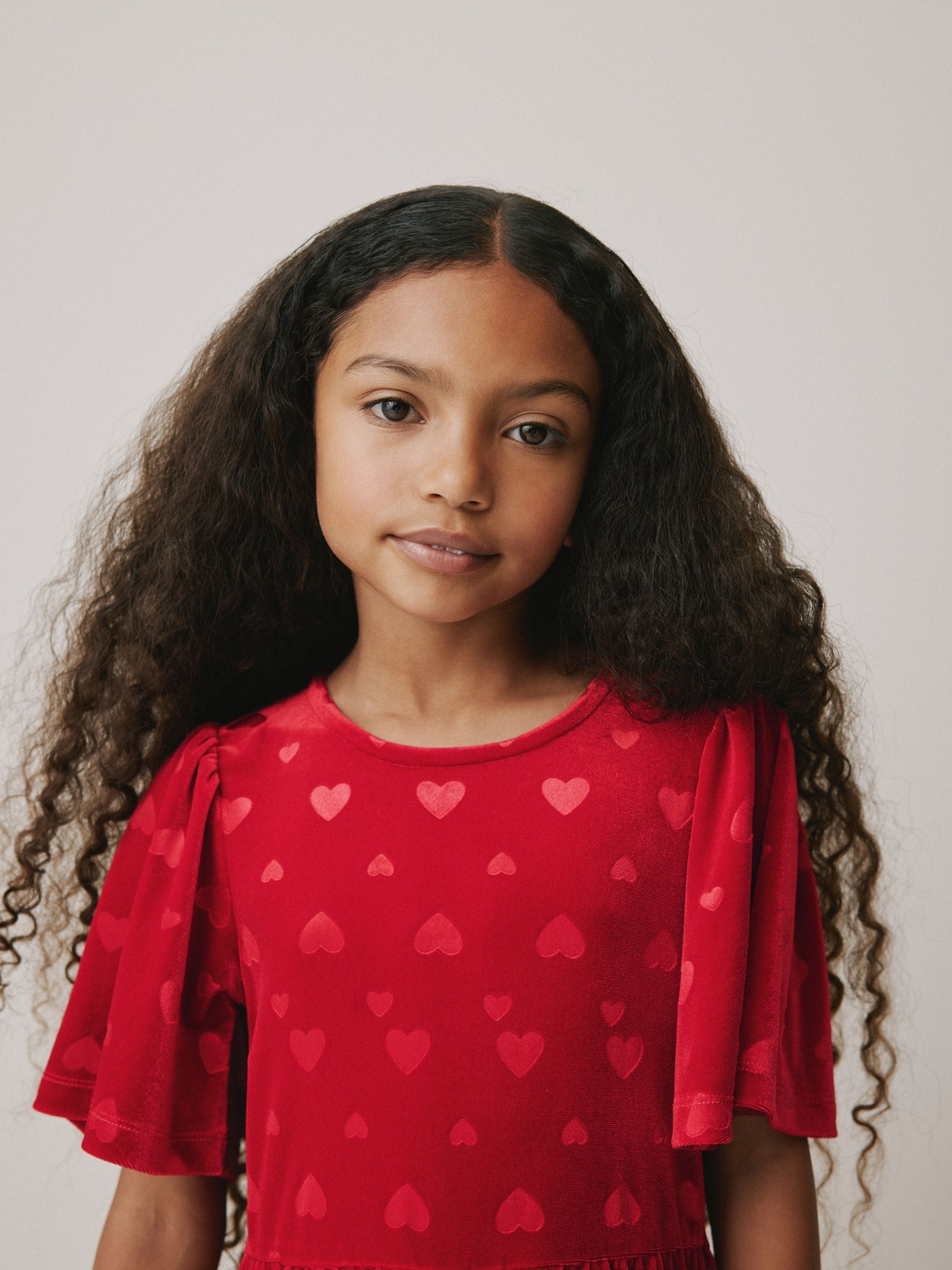 Buy Red Heart Embossed Velour Jumpsuit (3-16yrs) from Next Romania