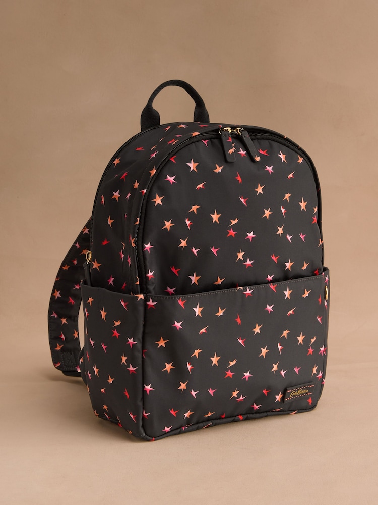 Cath Kidston Black Folding Star Ditsy Compact Backpack - Image 1 of 4 Cath Kidston Black Folding Star Ditsy Compact Backpack - Image 1 of 4