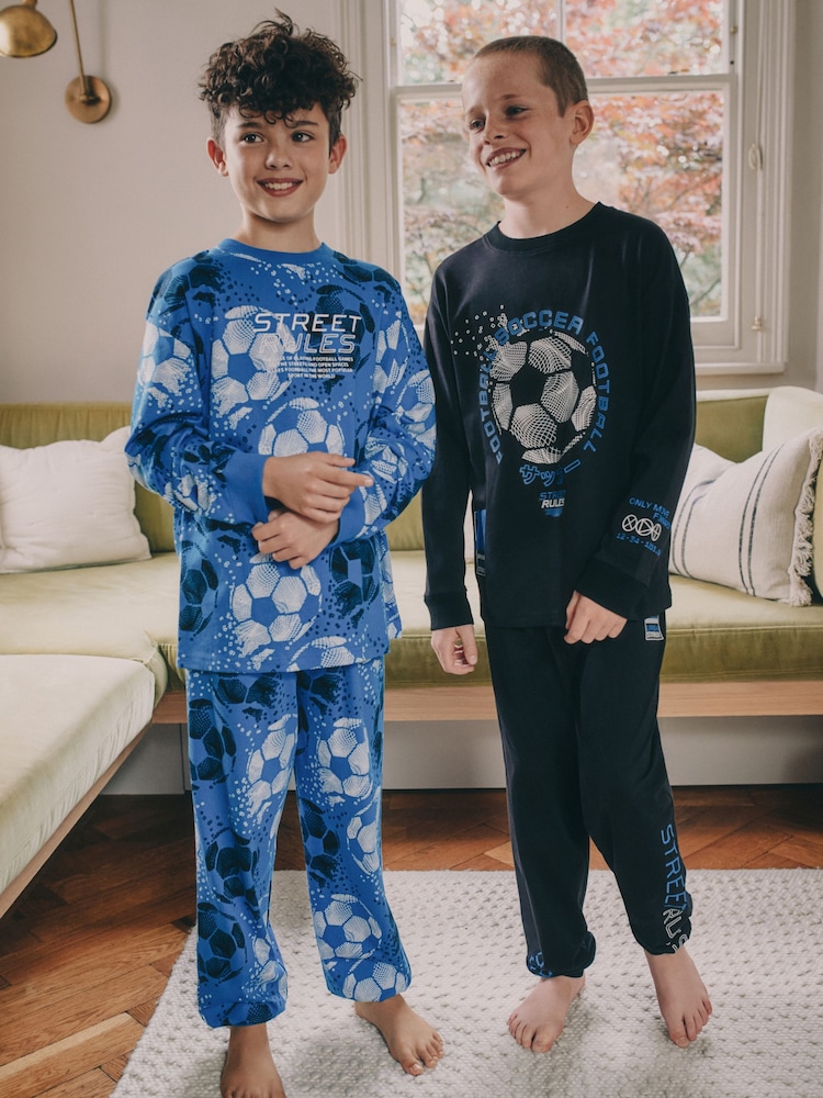Blue/Black Football Long Sleeve Pyjamas 2 Pack (3-16yrs) - Image 1 of 13 Blue/Black Football Long Sleeve Pyjamas 2 Pack (3-16yrs) - Image 1 of 13