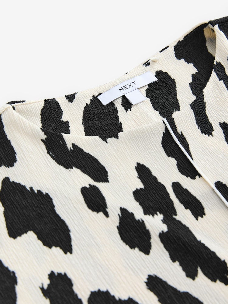 Cow Print Flutter Sleeve Textured Smart Top - Image 7 of 7