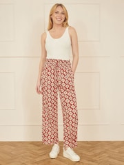 Yumi Red Relaxed Fit Geo Print Trousers - Image 1 of 4
