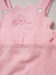 Rock-A-Bye Baby Boutique Pink Waffle 100% Cotton Romper and Sun Hat Outfit Set - Image 5 of 5