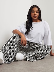 Yours Curve Black Abstract Wide Leg Trousers - Image 1 of 6