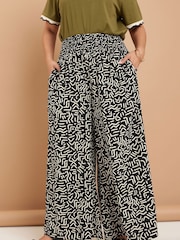 Yours Curve Black Shirred Waist Wide Leg Trousers - Image 1 of 5
