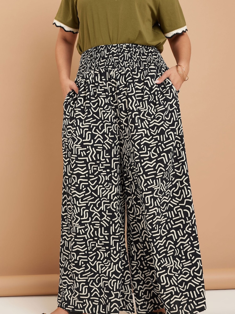 Yours Curve Black Shirred Waist Wide Leg Trousers - Image 1 of 5