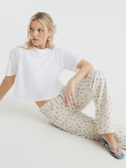 River Island Cream Relaxed Straight Ditsy Floral Print 100% Cotton Jeans - Image 1 of 4