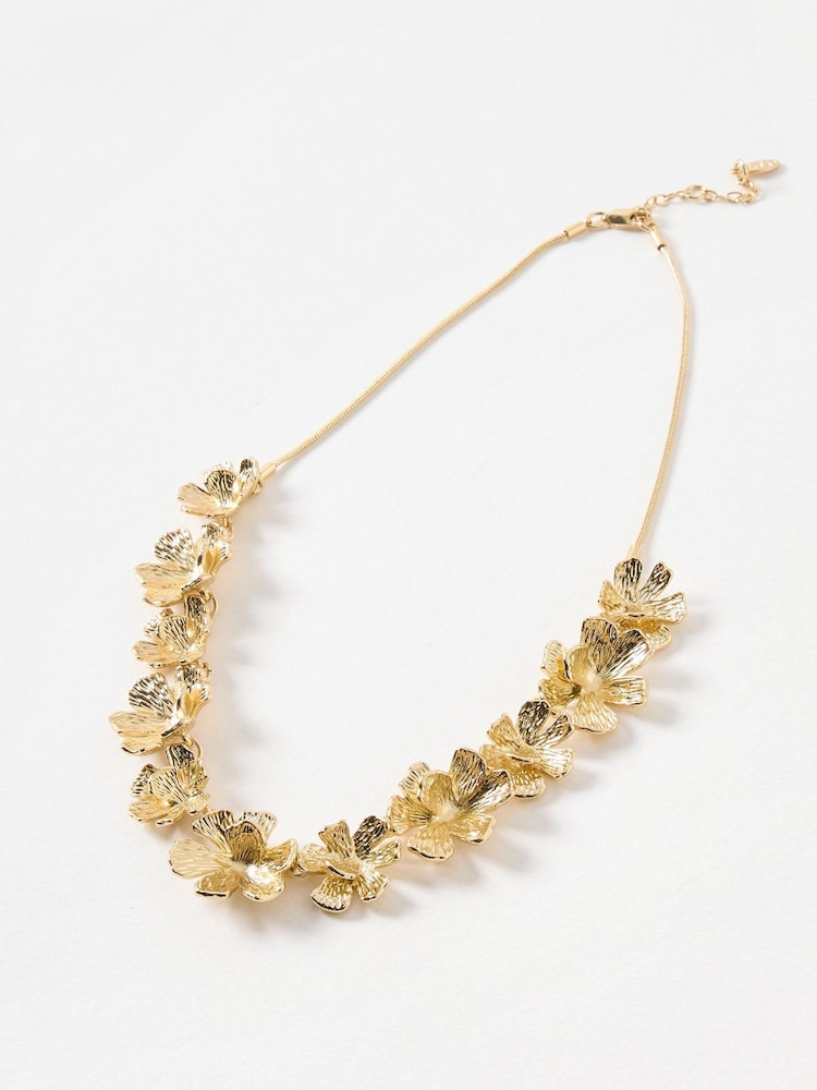 Oliver Bonas Gold June Cast Flowers Cord Collar Necklace - Image 1 of 3