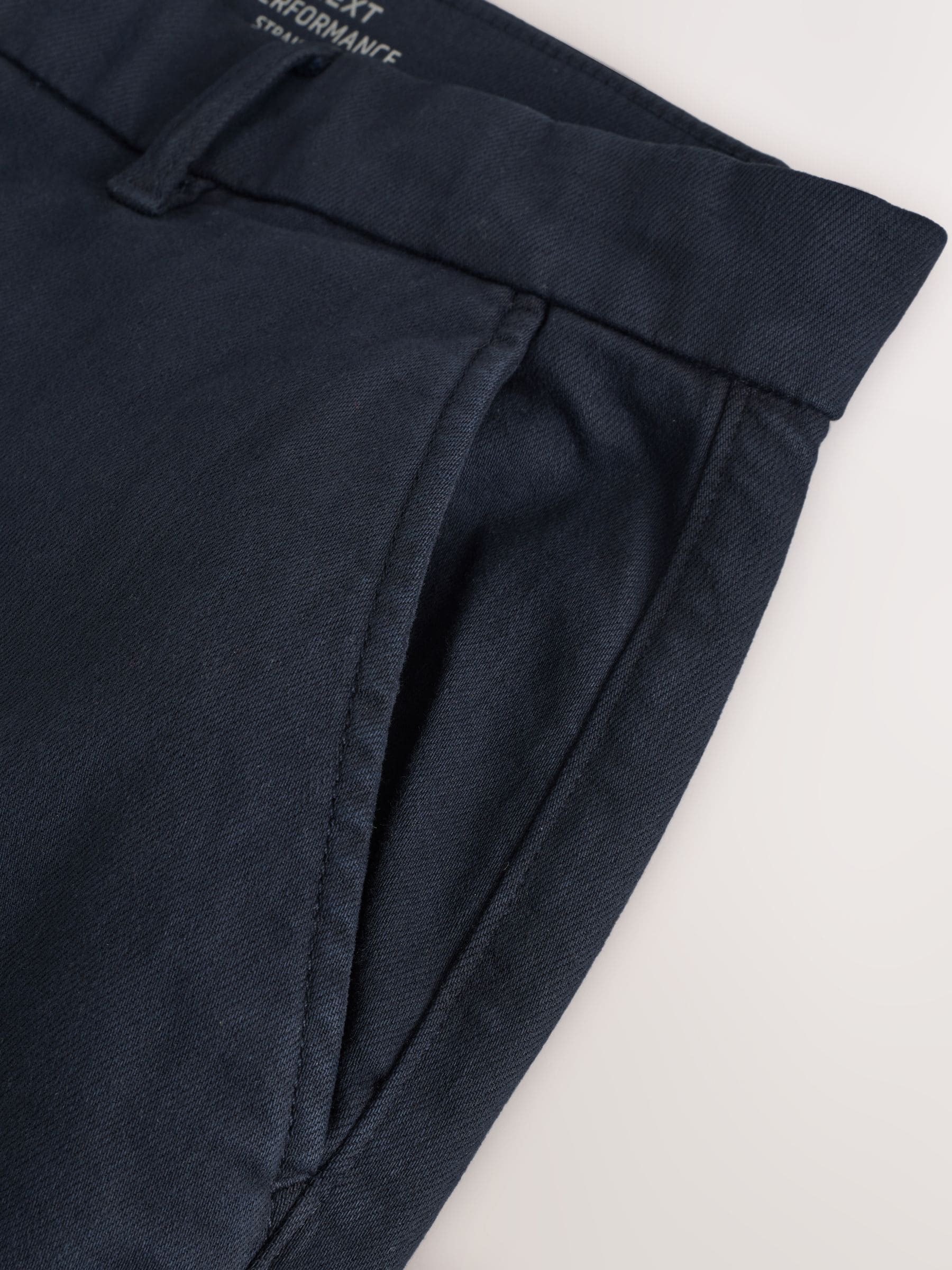 Buy Navy Straight Fit Motionflex Chino Trousers from Next Romania
