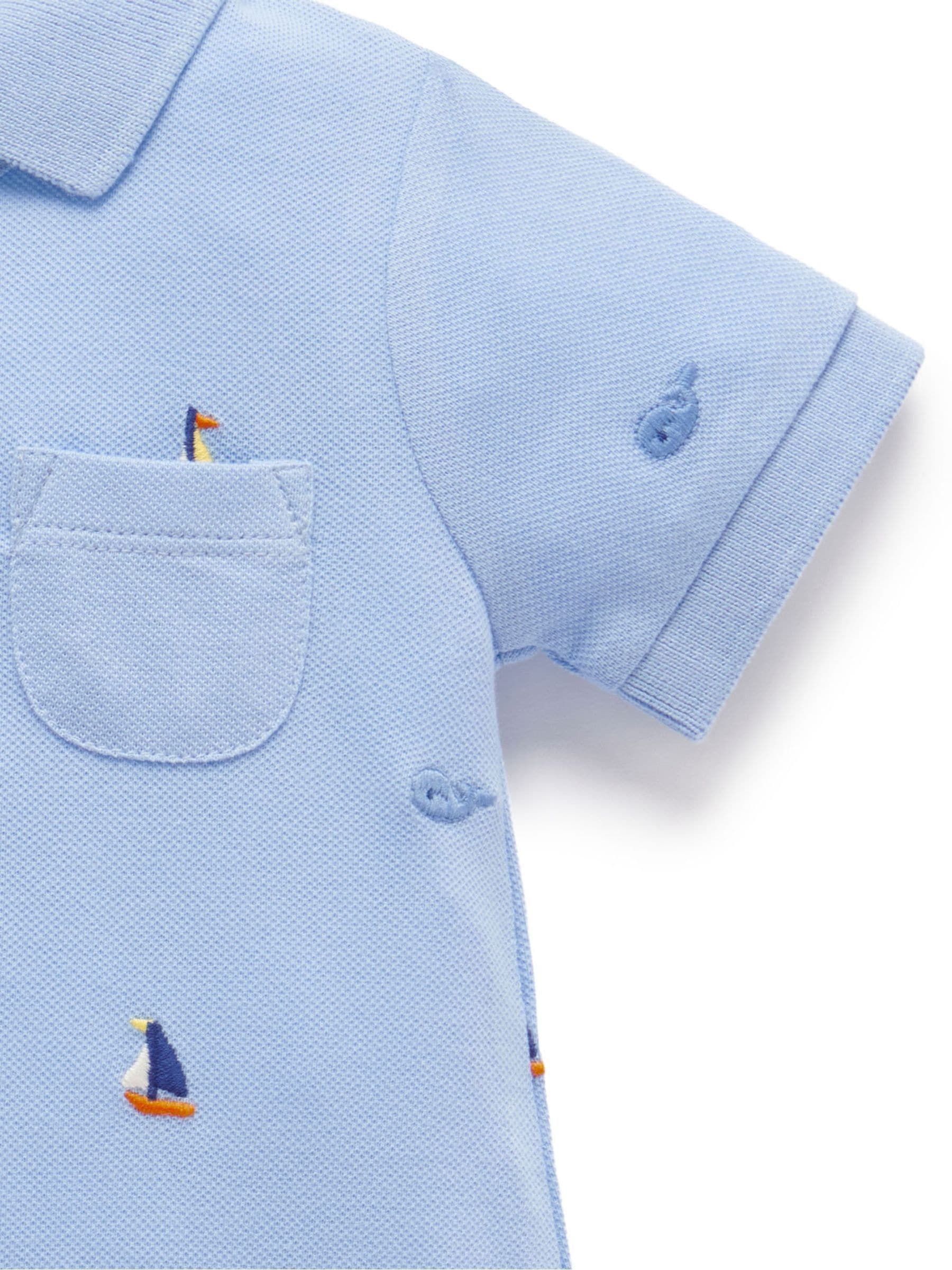 Przeglądaj Purebaby 100% Cotton Emboided Polo Romper z Next