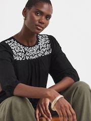 JD Williams Black Floral Embroidered Blouson Longline Top - Image 1 of 4