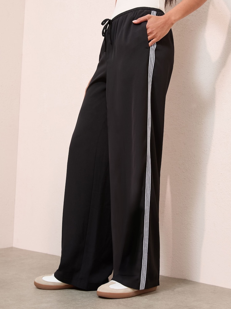 Friends Like These Black Side Stripe Pull On Trousers - Image 1 of 4 Friends Like These Black Side Stripe Pull On Trousers - Image 1 of 4