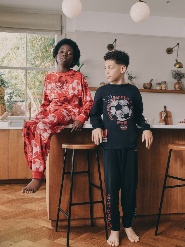 Red/Black Football Long Sleeve Pyjamas 2 Pack (3-16yrs) - Image 1 of 11 Red/Black Football Long Sleeve Pyjamas 2 Pack (3-16yrs) - Image 1 of 11