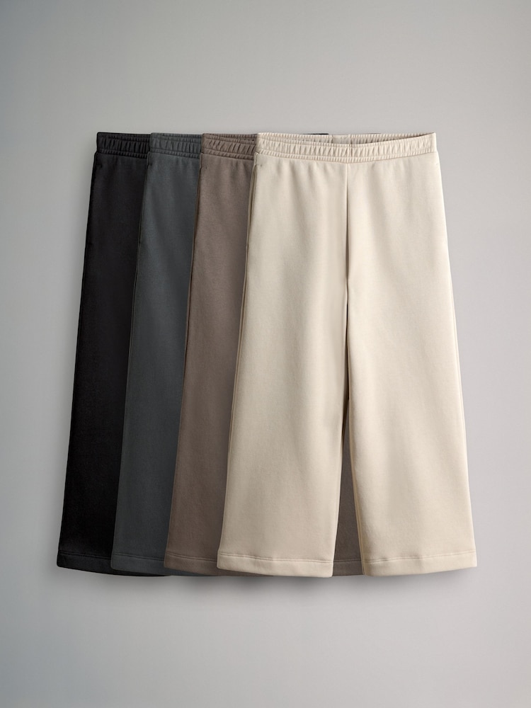 The Set Black/Brown 4 Pack Wide Leg Joggers - Image 1 of 7 The Set Black/Brown 4 Pack Wide Leg Joggers - Image 1 of 7