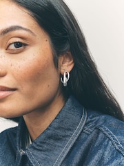 Silver Tone Crossover Hoop Earrings - Image 1 of 7