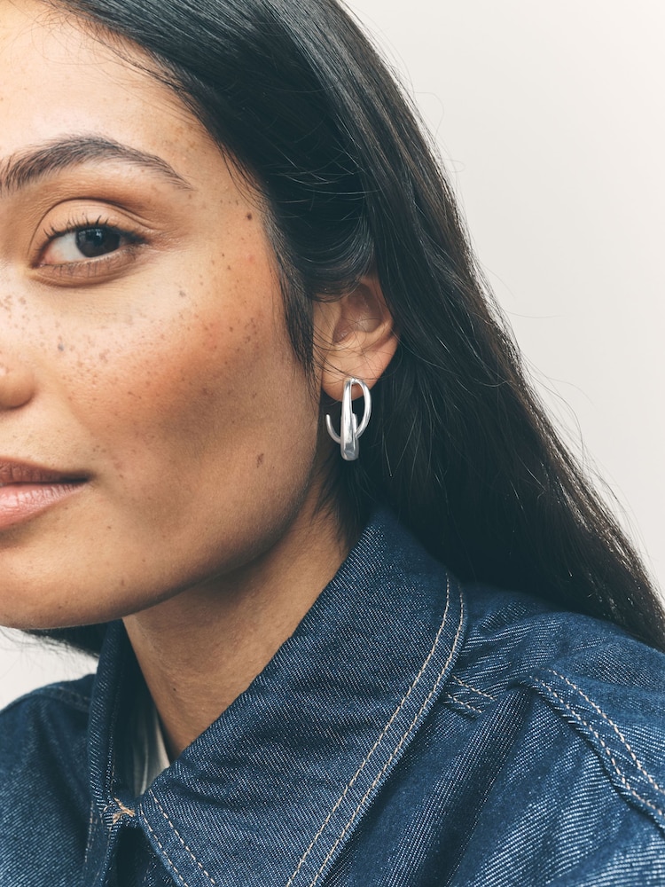 Silver Tone Crossover Hoop Earrings - Image 1 of 7