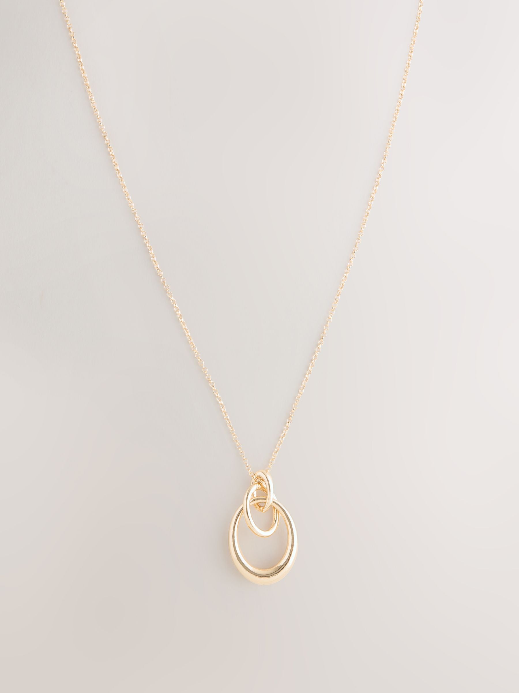 Buy Gold Tone Interlocking Circle Pendant Necklace from Next Romania