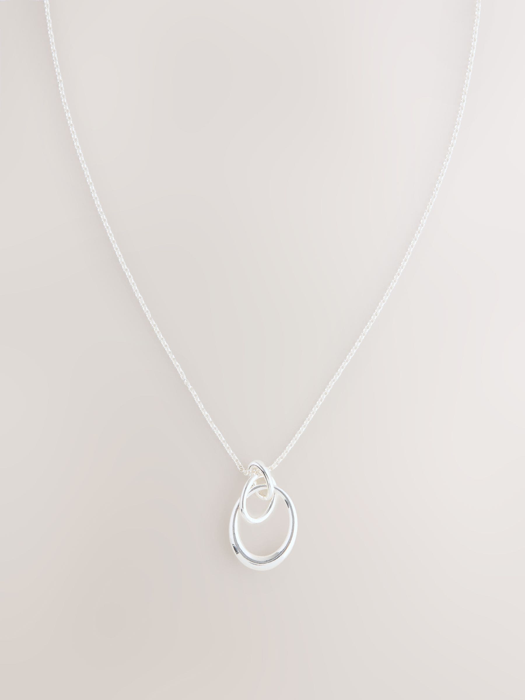 Buy Silver Tone Interlocking Circle Pendant Necklace from Next Romania