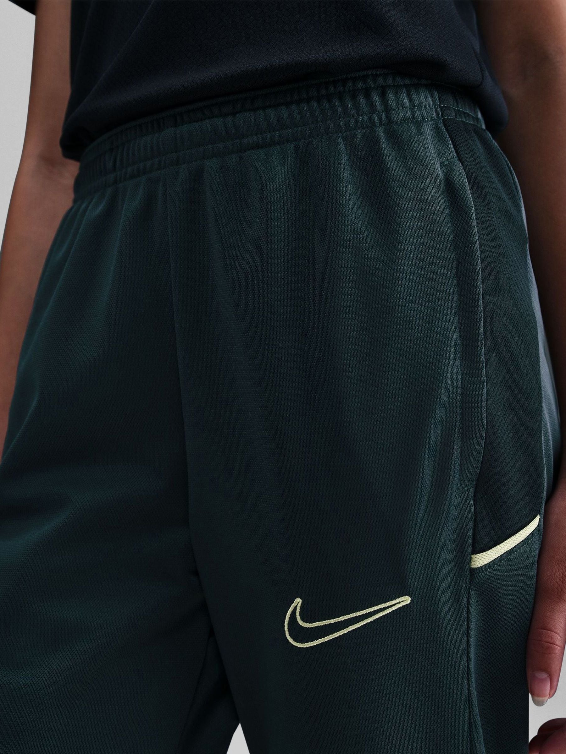nike academy track pants green