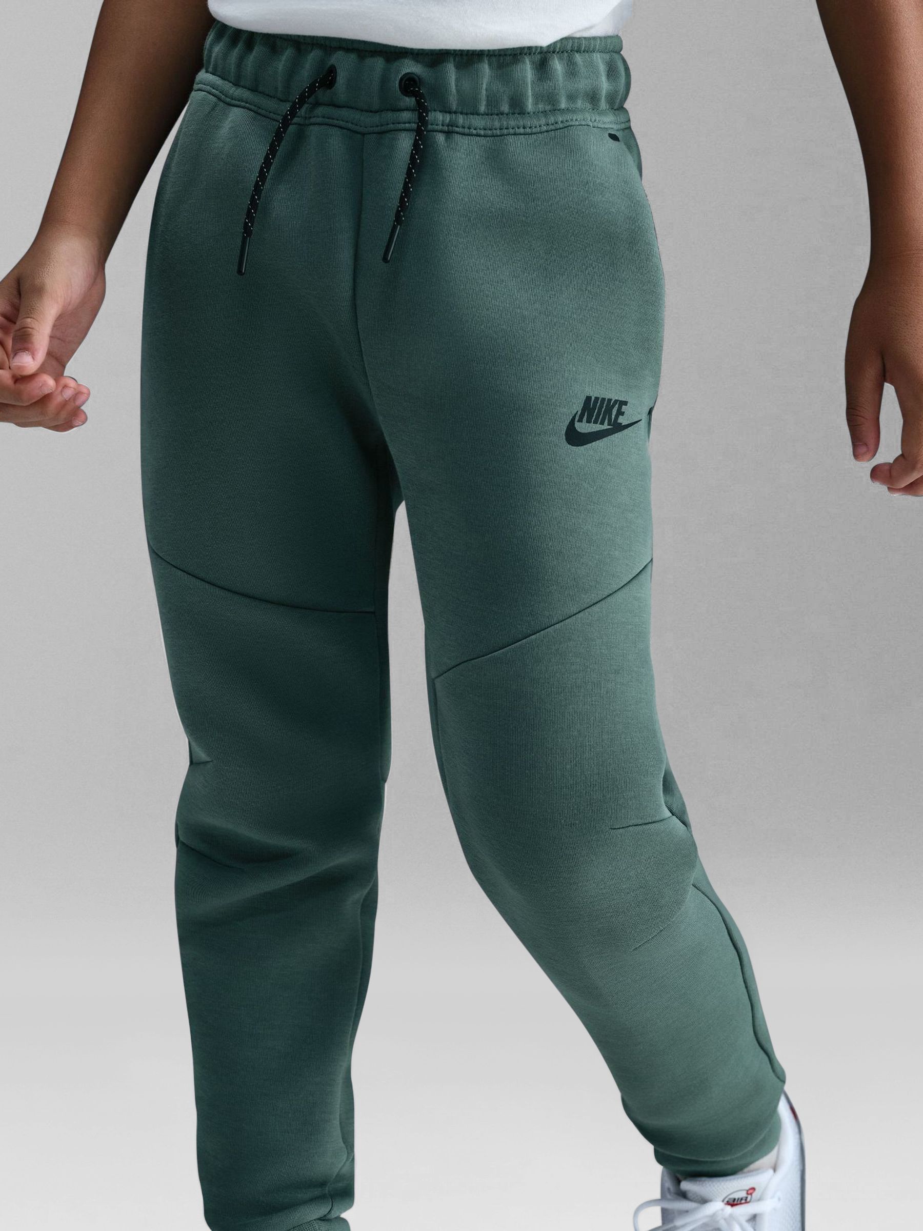 nike tech joggers green