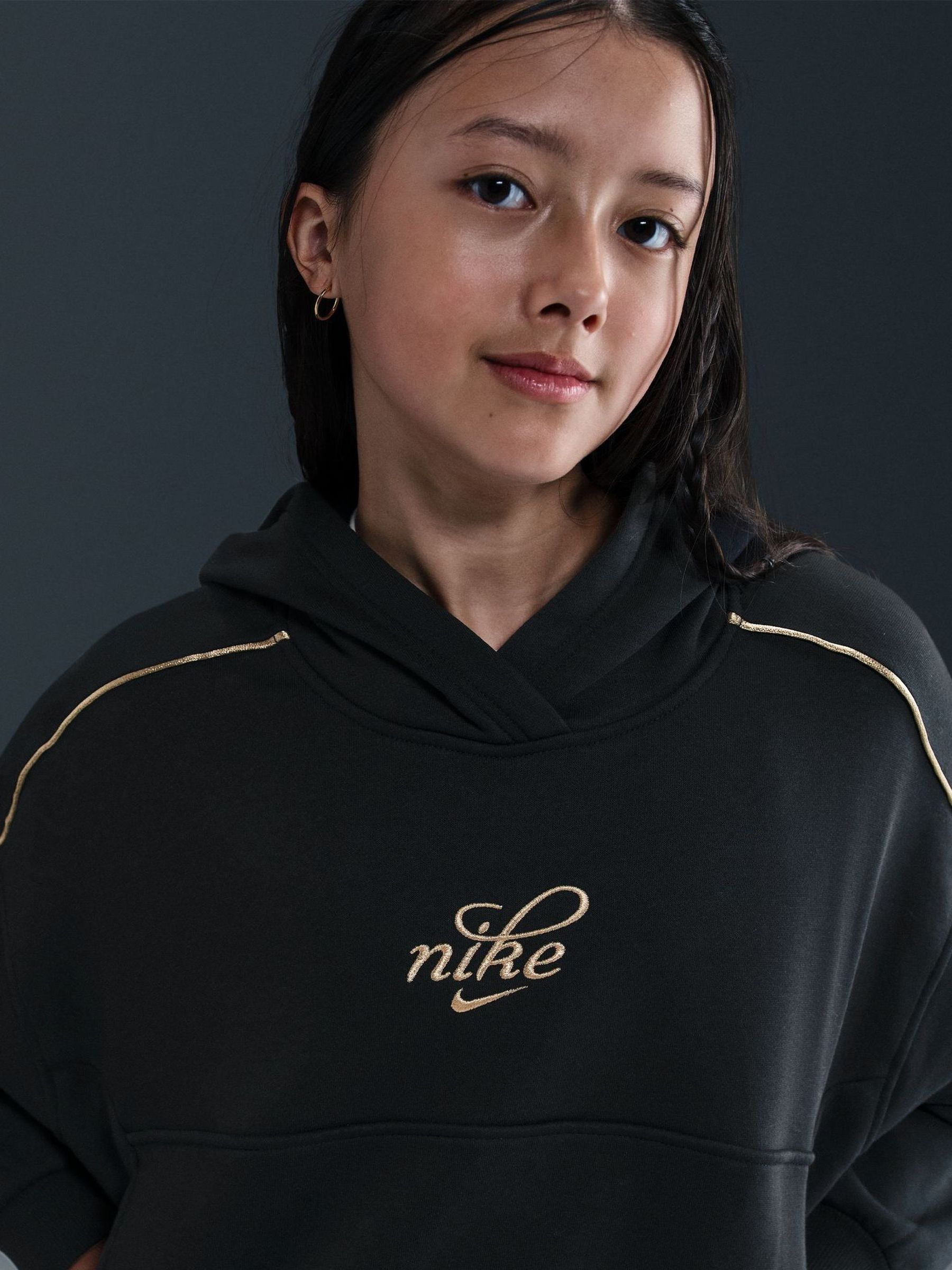womens nike hoodie black and gold