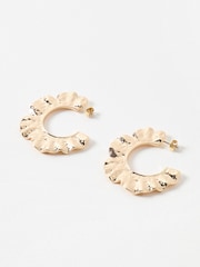 Oliver Bonas Gold Tone Hera Hammered Floral Print Curve Large Hoops Earrings - Image 1 of 5