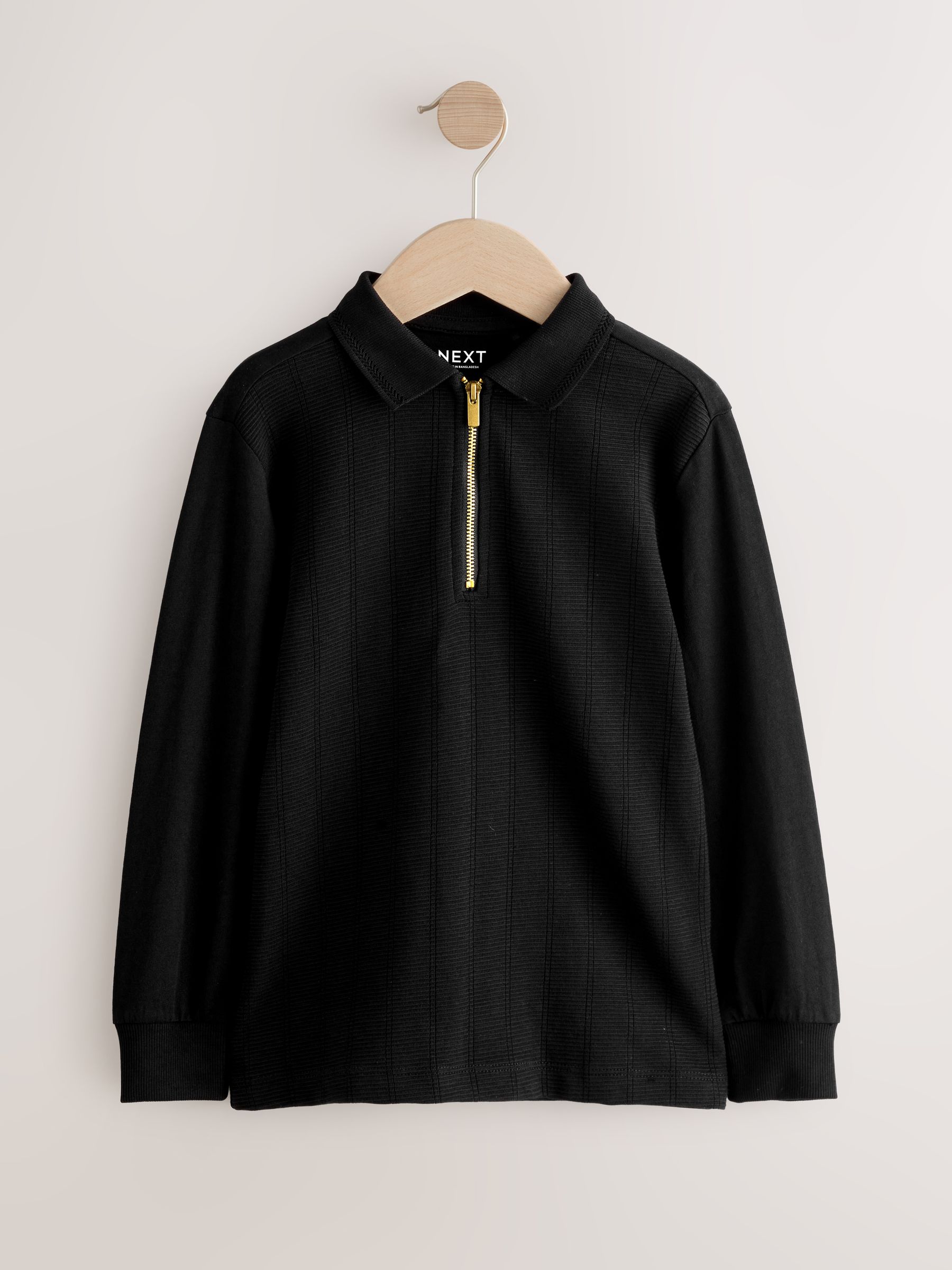 Next：日本 ブラック - ジップネック テクスチャード 長袖 ポロシャツ
