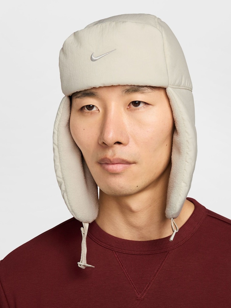 Nike Grey Fly Puffer Trapper Cap - Image 1 of 4 Nike Grey Fly Puffer Trapper Cap - Image 1 of 4