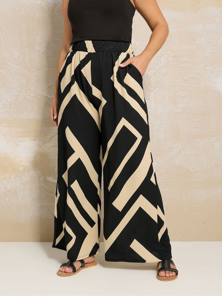 Yours Curve Black Crinkle Wide Leg Trousers - Image 1 of 5