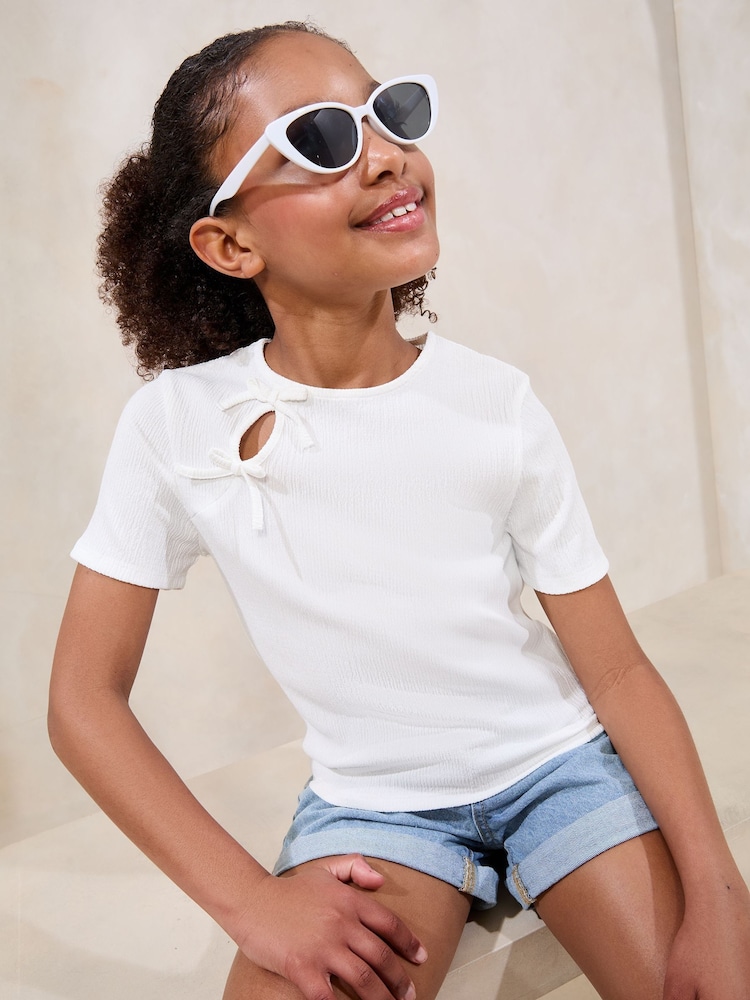 Lipsy 2 Pack Bow Eyelet Detail Tops (5-16yrs) - Imagen 7 de 7