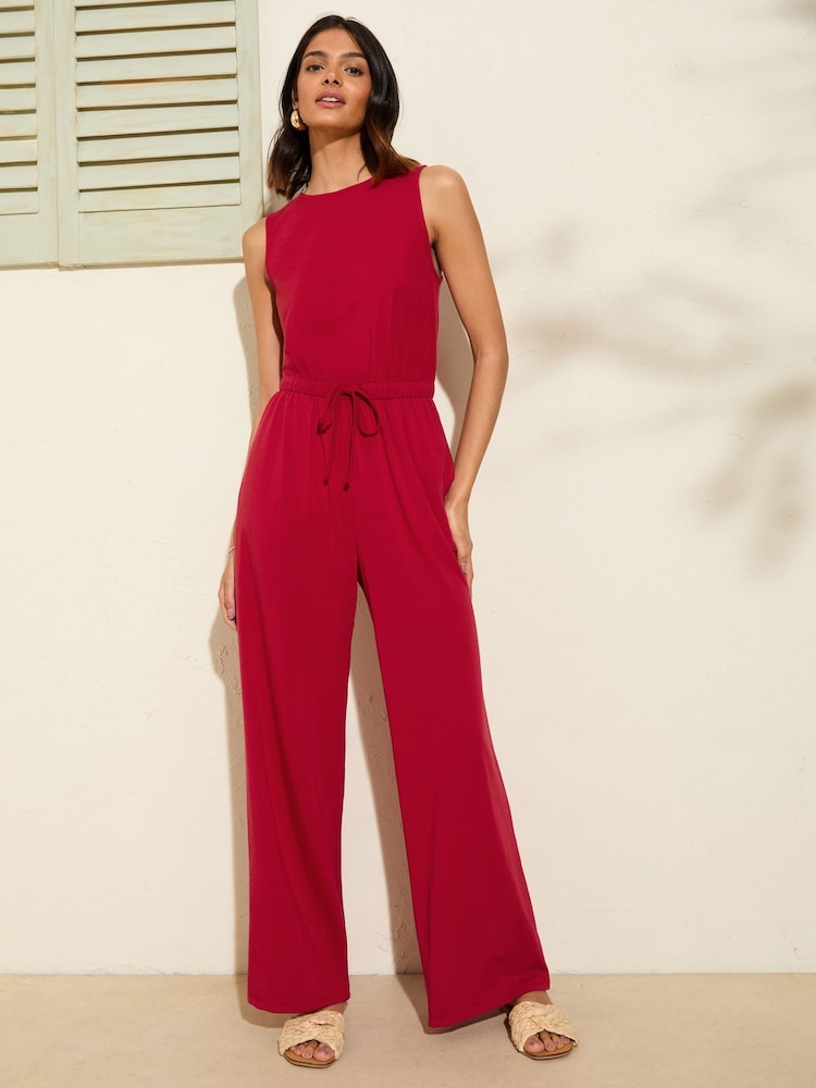 Friends Like These Berry Red Scoop Neck Sleveless Wide Leg Jersey Jumpsuit - Image 1 of 4
