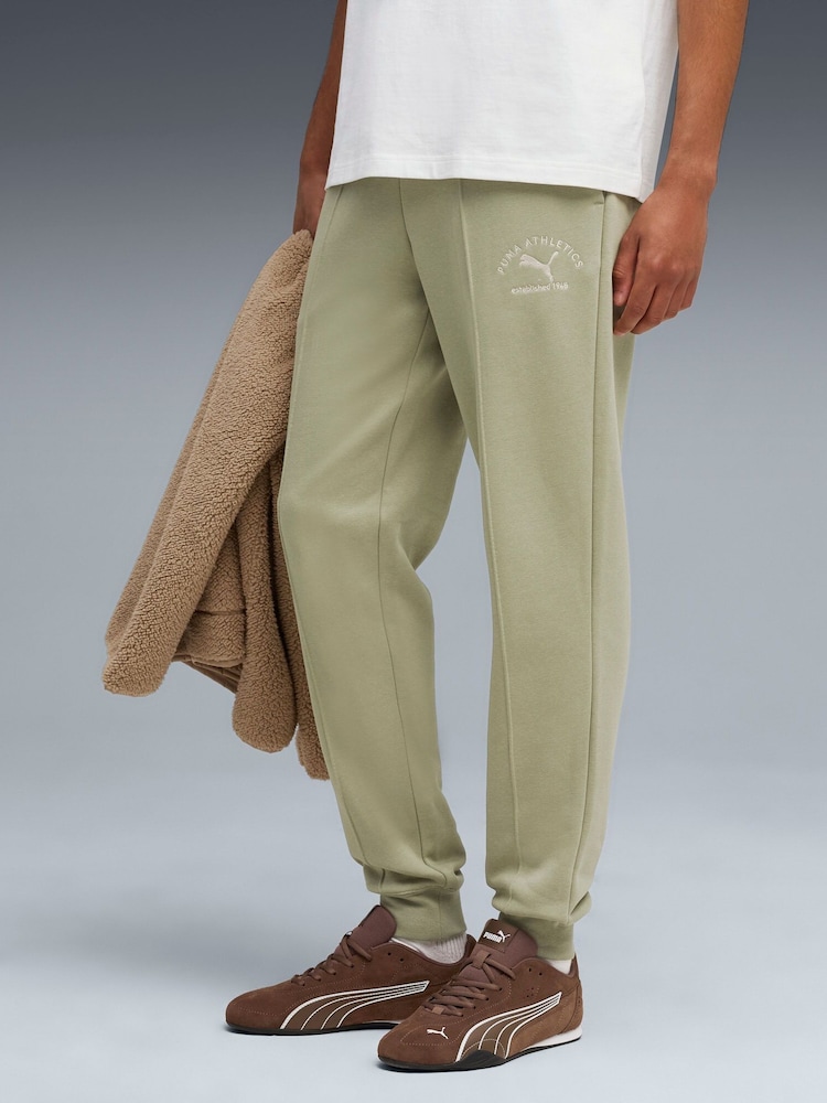 Puma Khaki Green Mens Classic Graphic Joggers - Image 1 of 5 Puma Khaki Green Mens Classic Graphic Joggers - Image 1 of 5