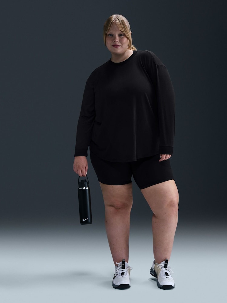 Nike Black Curve One Relaxed Dri-FIT Long-Sleeve Top - Image 1 of 5 Nike Black Curve One Relaxed Dri-FIT Long-Sleeve Top - Image 1 of 5