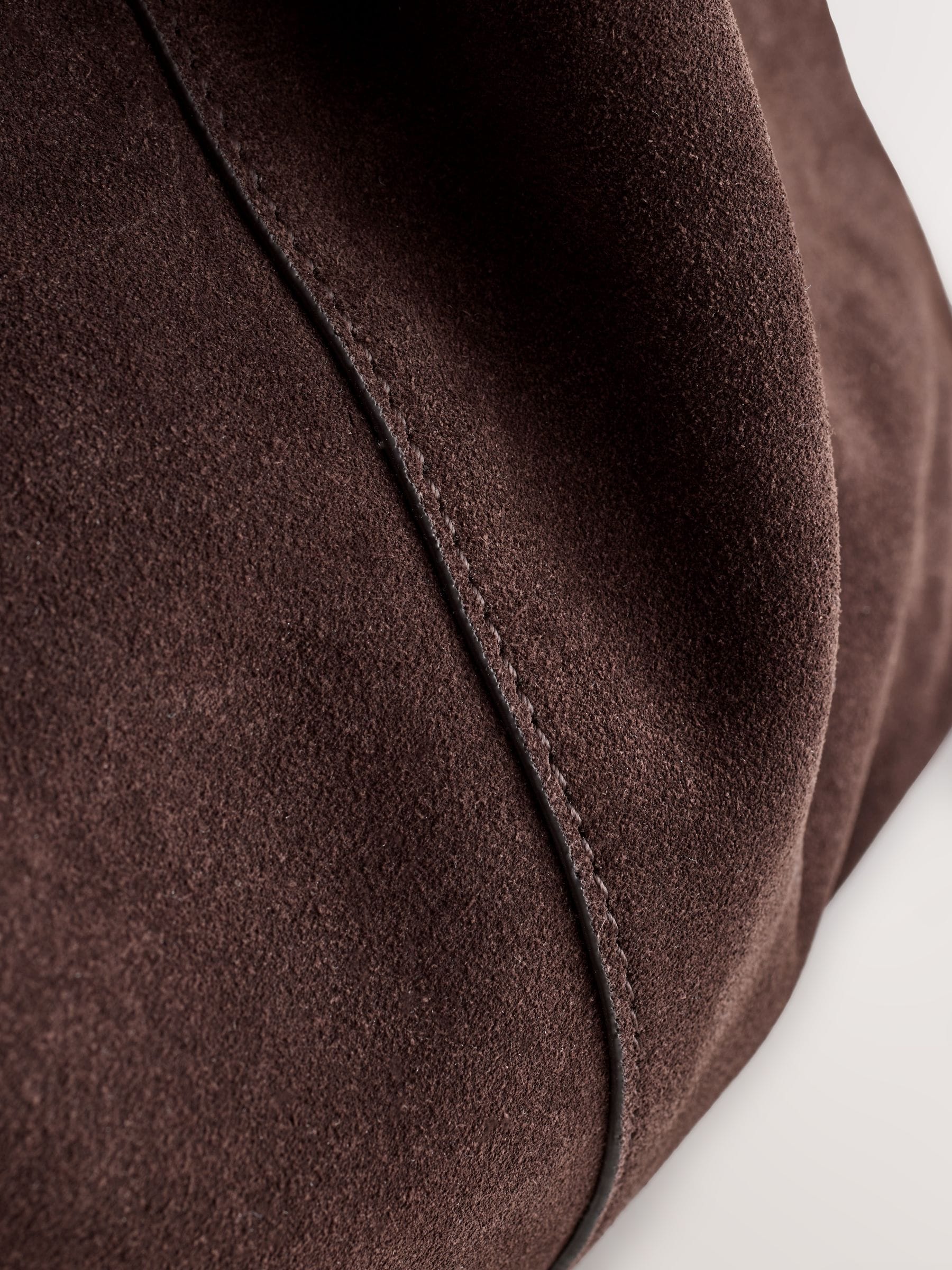 Buy Chocolate Brown Suede Leather Slouchy Shoulder Bag from Next