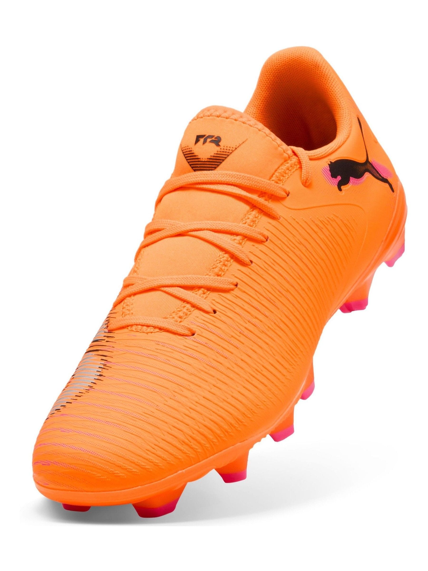 orange football cleats