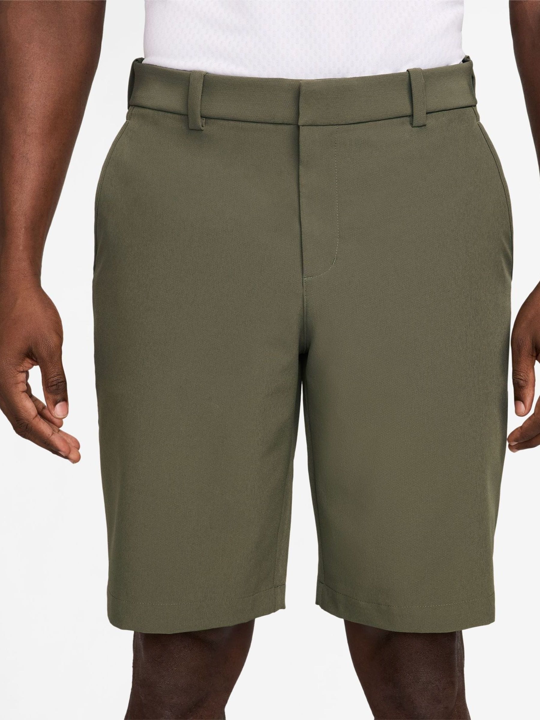 green nike golf shorts